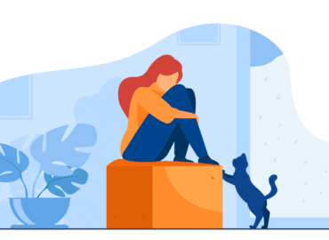 Ilustração de uma mulher sentada em cubo com a cabeça entre os joelhos demonstrando tristeza. à sua frente tem um gato olhando para ela